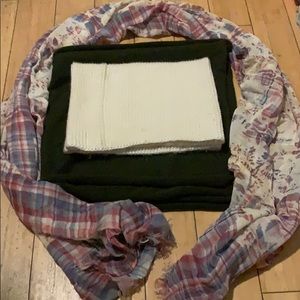 Three scarfs, two knitted, one open.